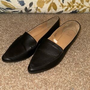 Black faux leather women’s loafers with pointed toe